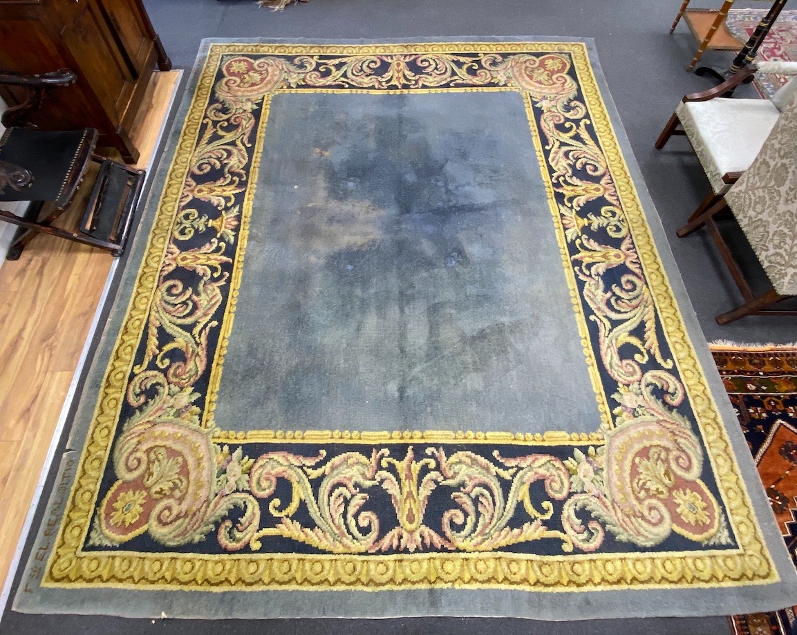 A Spanish polychrome wool carpet marked Aranjuez and dated 1925, 382 x 310cm